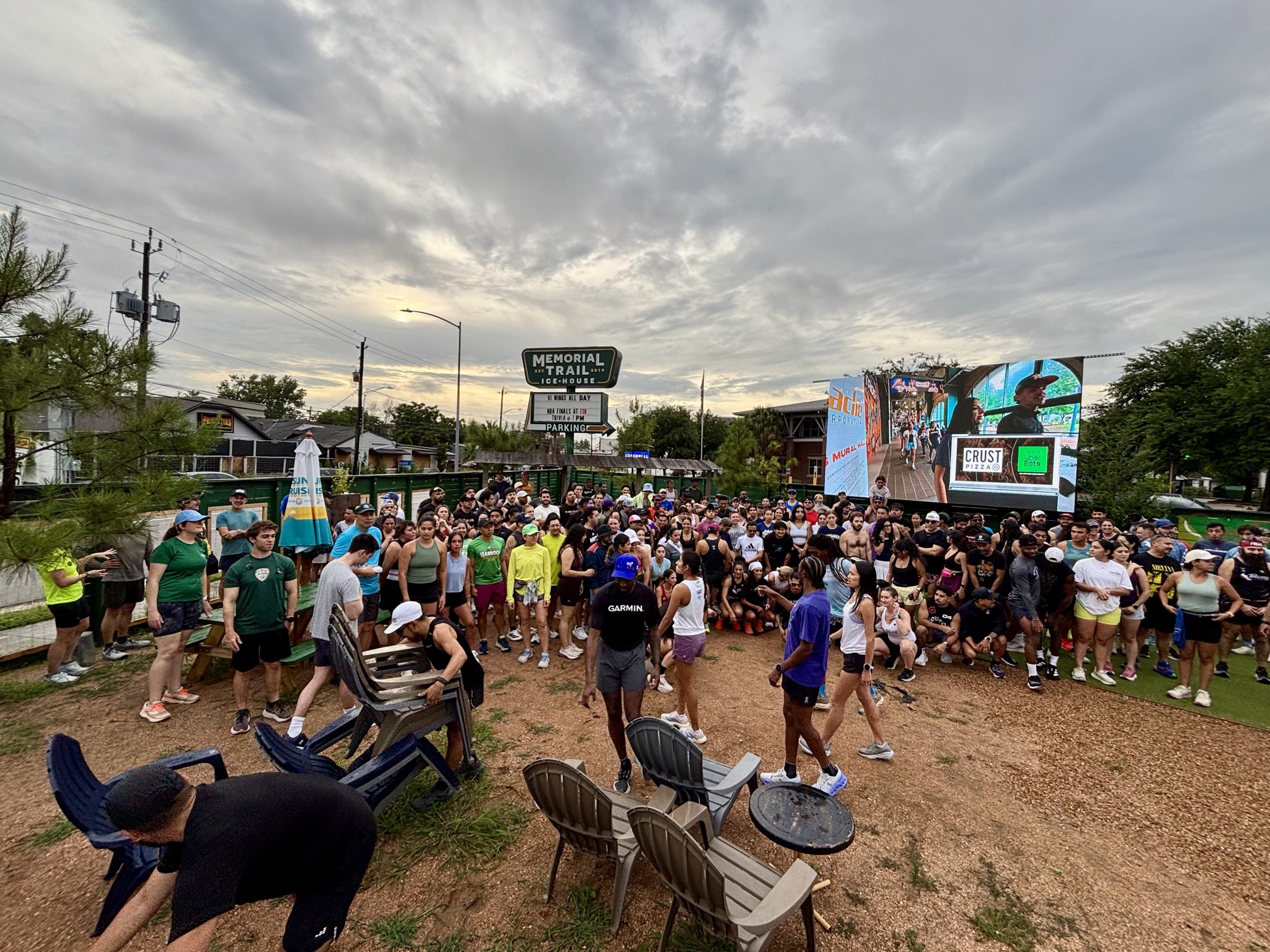 Run club crowd gathered at Memorial Trail Ice House